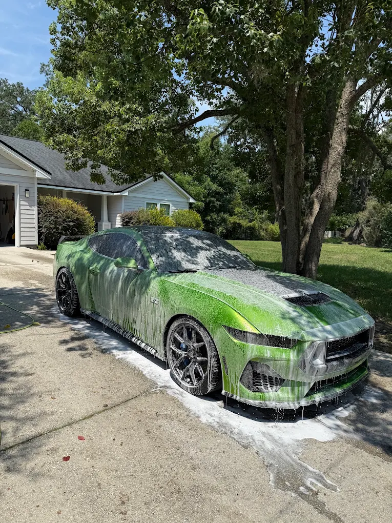 Green Mustang during its foam wash