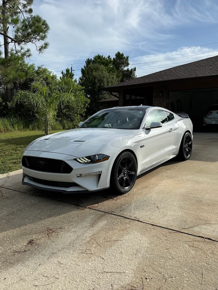 White Ford Mustang after detailing